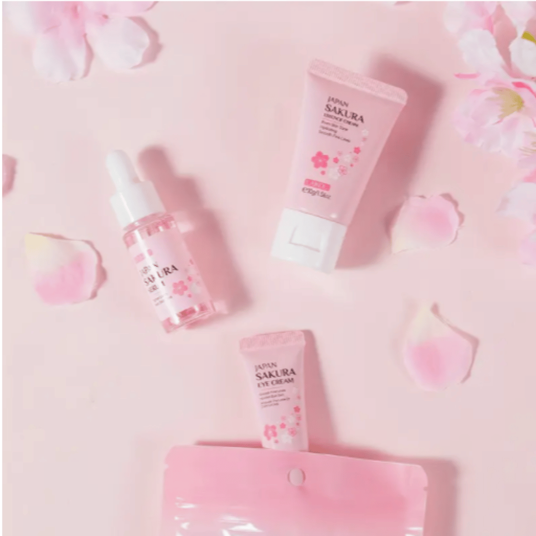 skincare set with blossom leaves and pink package